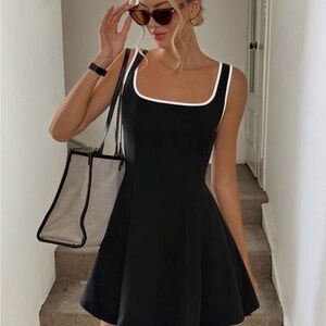 Elegant Black Mini Dress with White Trim